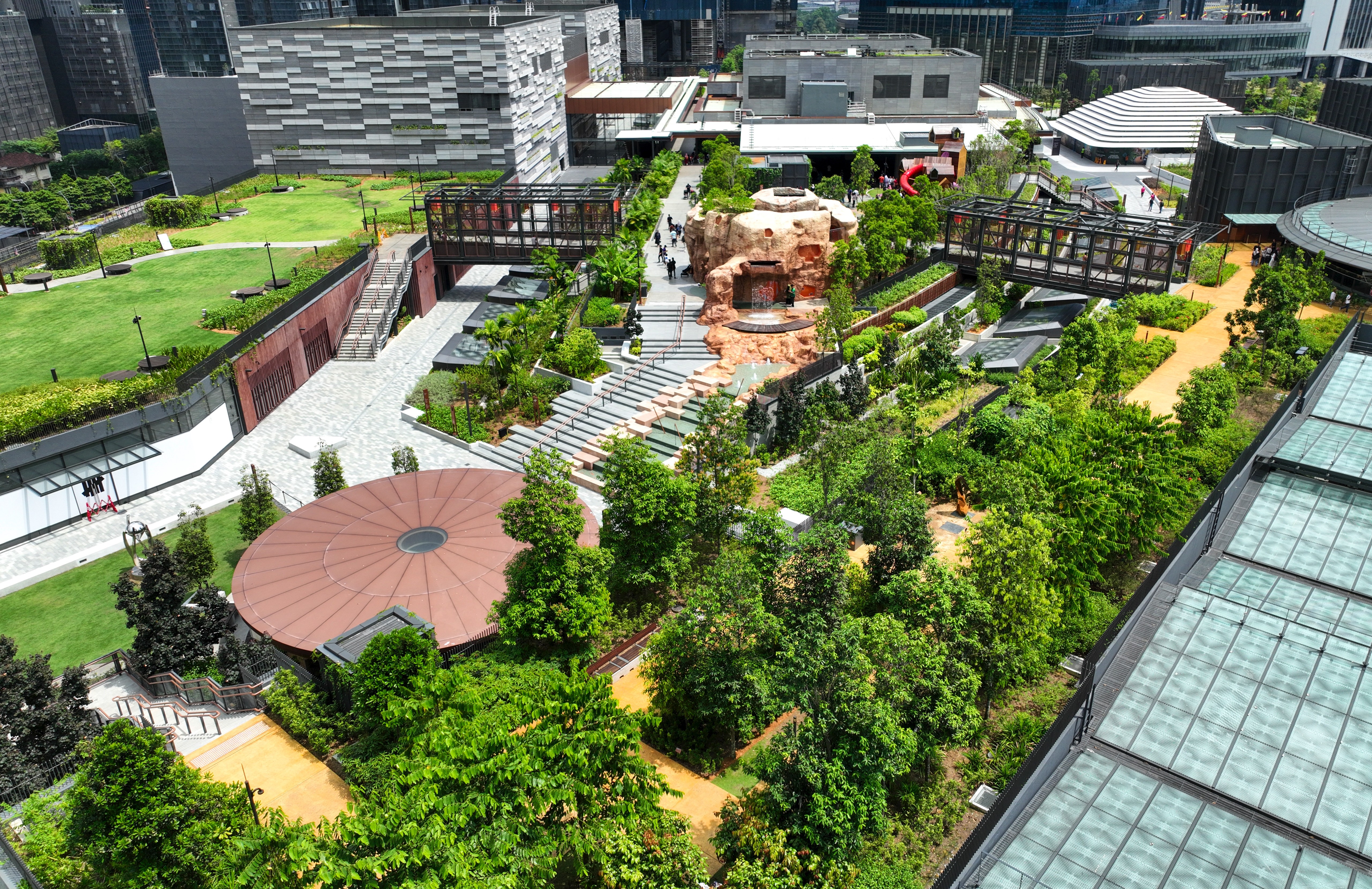 Leafy walking trails and open green spaces at the 10-acre TRX City Park